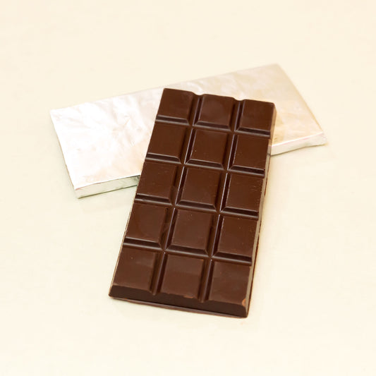 Tiguere — Barra de cacao 70% con naranja y cardamomo
